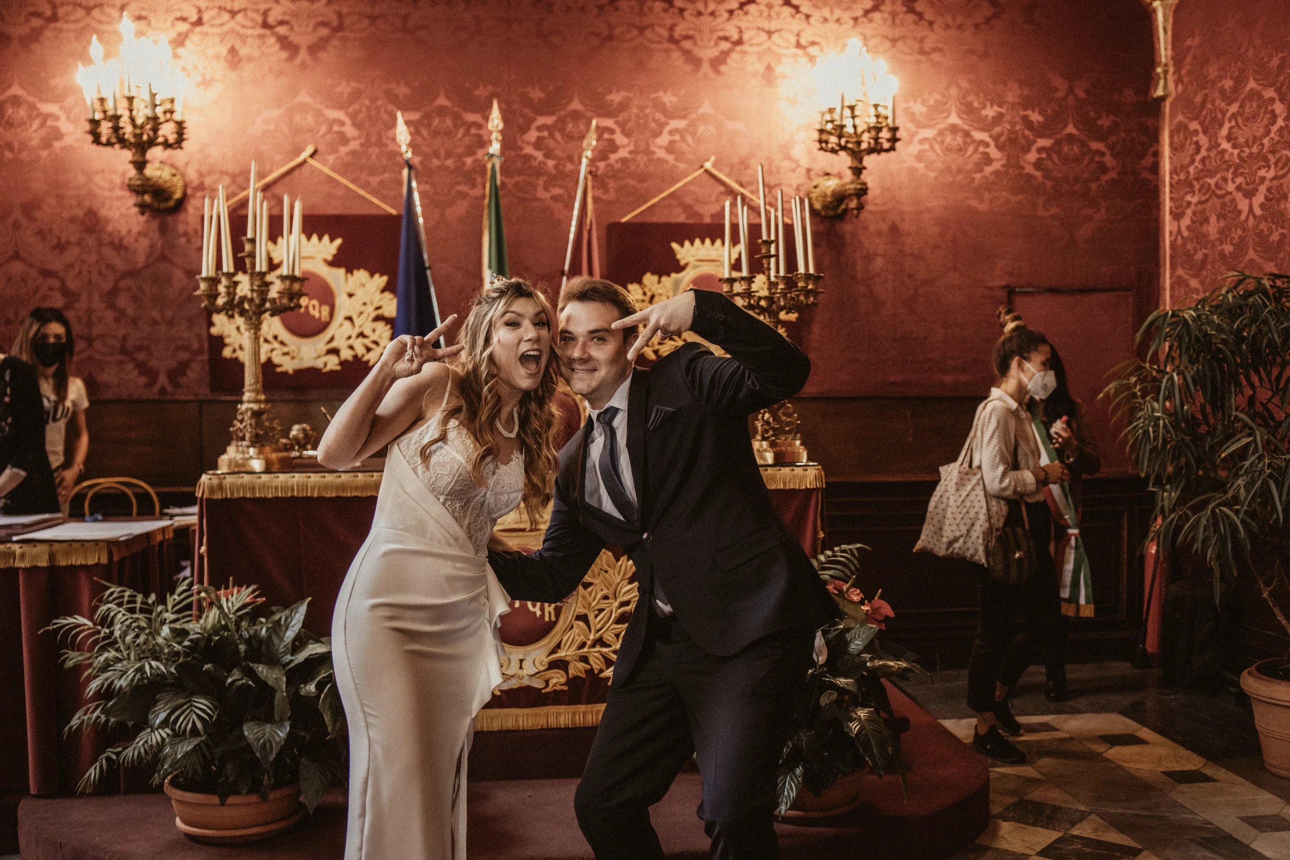 A Croatian couple has fun after their wedding in Rome.