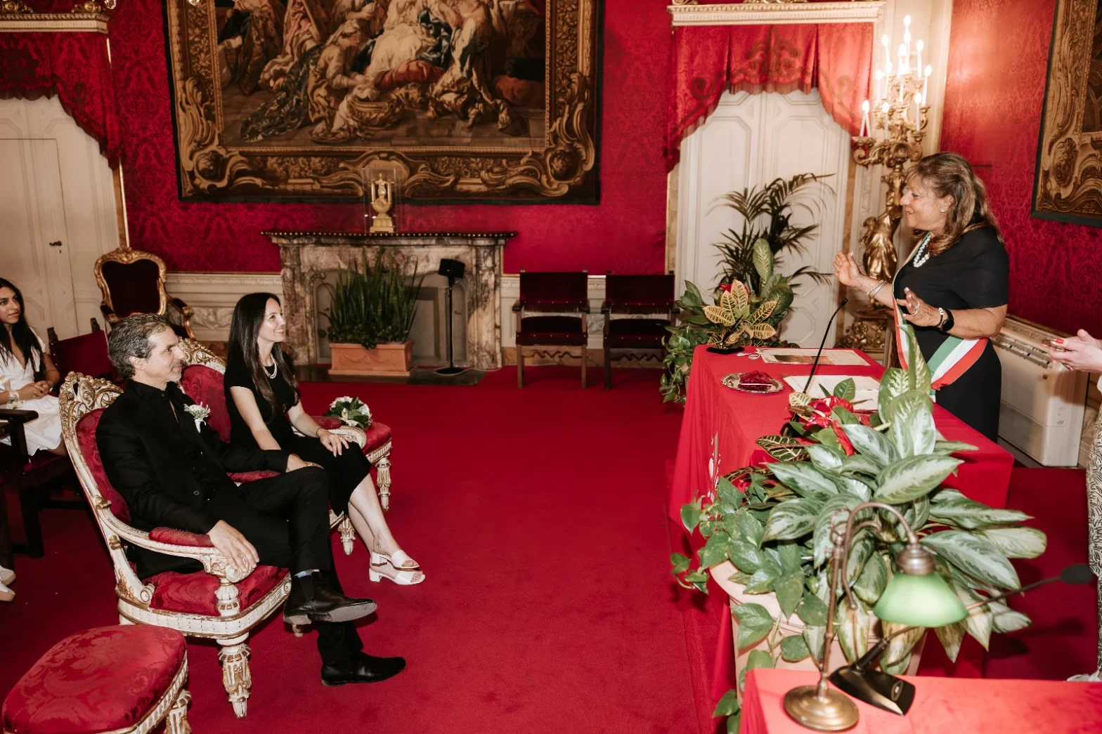 Two American citizens getting legally married in the Sala Rossa of Florence City Hall