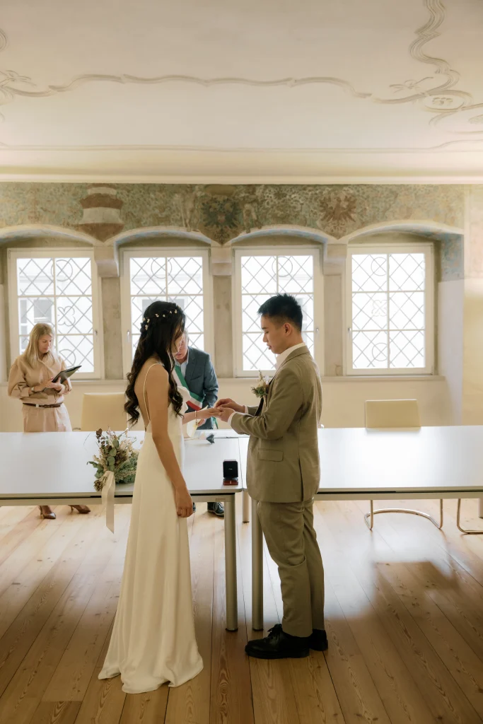 Singaporean citizens getting legally married in Italy in an Italian town hall.